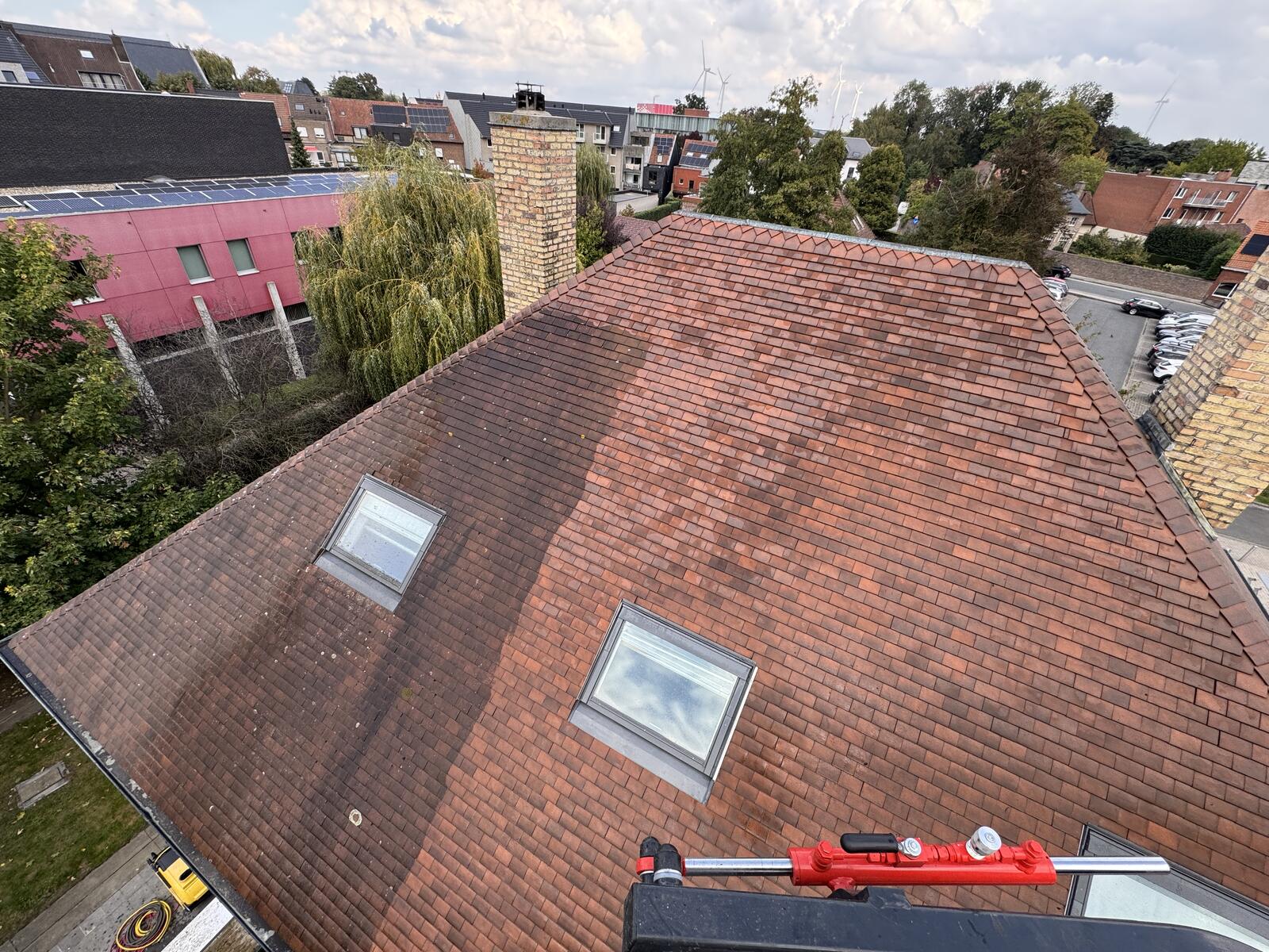 afspuiten van tegelpannen